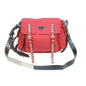 Prada VELA shoulder bag red studs